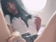 Ασιατικό κορίτσι μαλακία στο αεροπλάνο